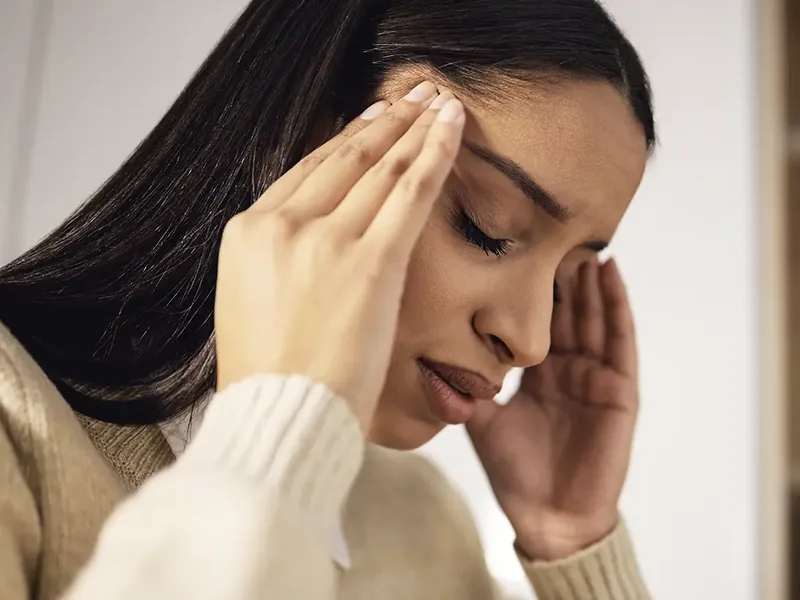 Physical therapist checking a patient&rsquo;s eye movements and balance reactions during a vestibular evaluation