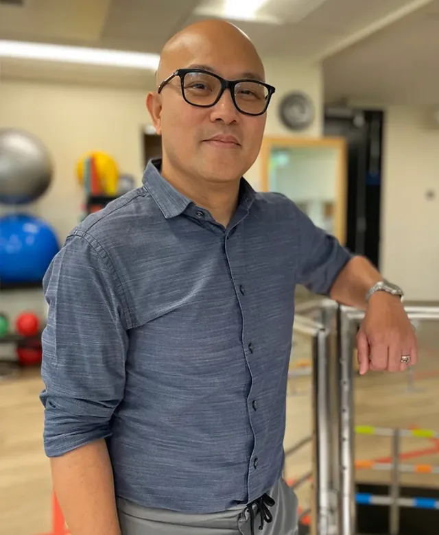 Portrait of Dr. Carlos Pineda III, co-founder of The PT People