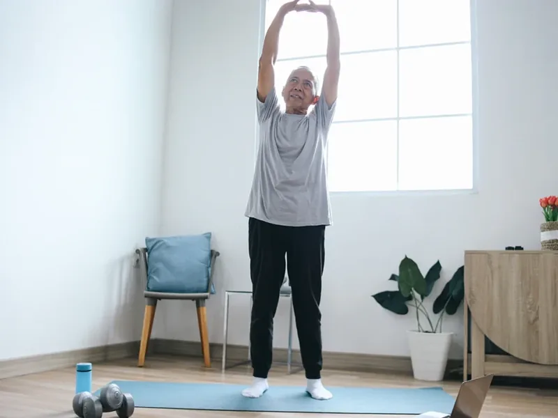 Patient practising the everyday movements that keep pain from coming back